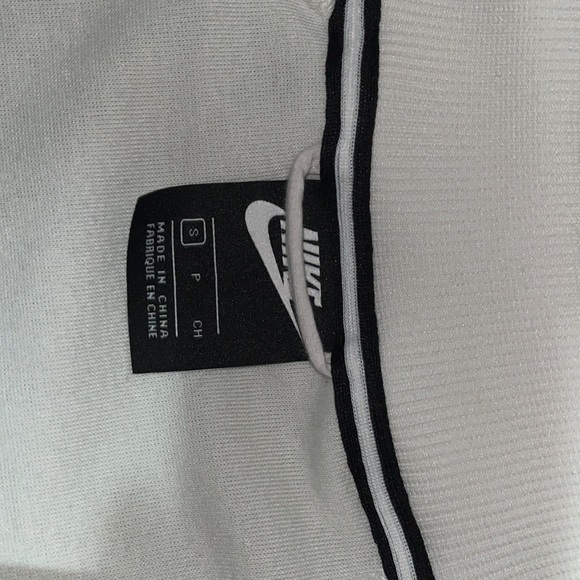 Cream/off-white Nike jacket w/ black and green stripe down the side - Picture 5 of 5